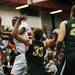 Milan High School CJ Turnage shoots during the game against Monroe State Mary Catholic Central on Friday, Jan. 25. Daniel Brenner I AnnArbor.com